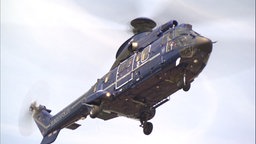 Innenminister de Maizière fliegt im Hubschrauber ein